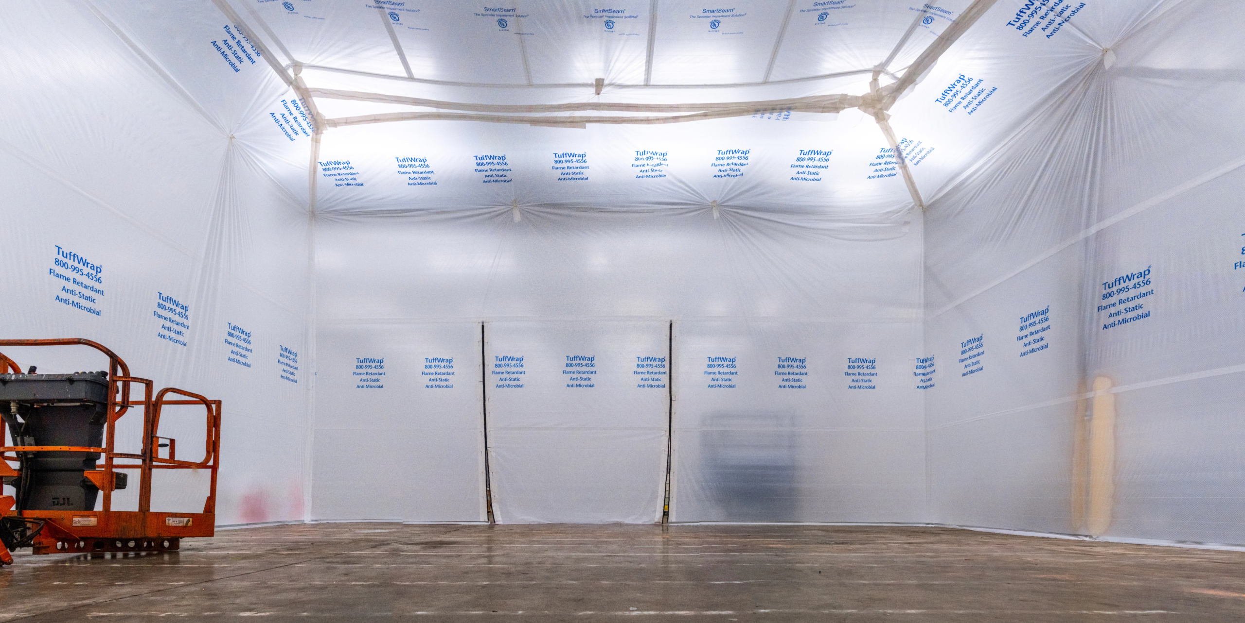 Code-compliant suspended cover containment system diagram and certifications